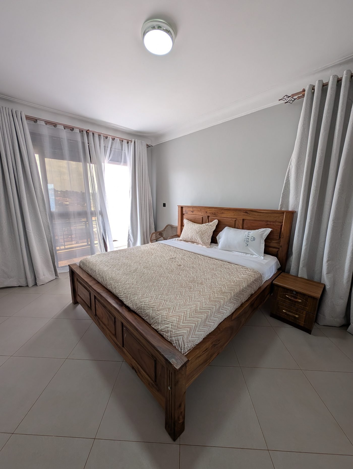 Standard guest room with Bakerm Hotel bedding